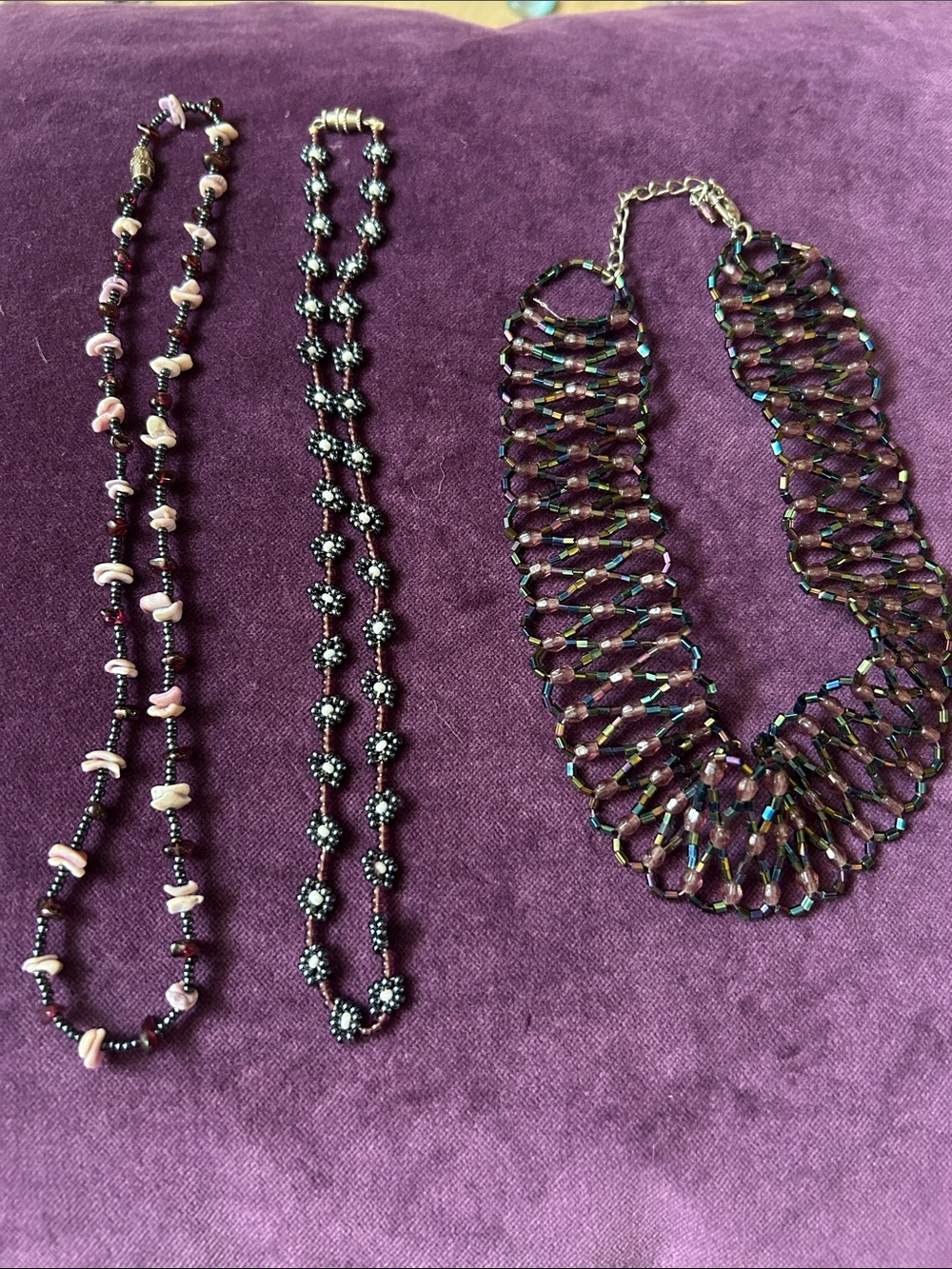 A set of three beaded necklaces